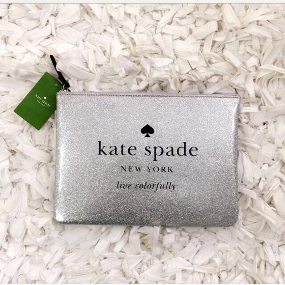 kate spade Handbags - Kate Spade Silver Clutch Handbag